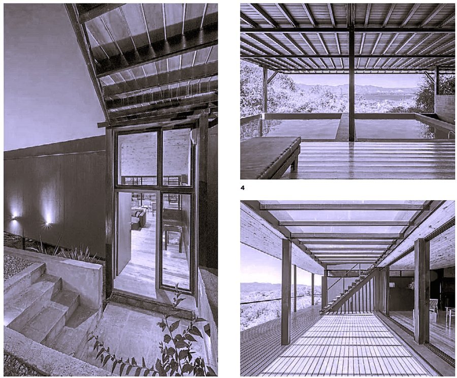 Black and white study of a concrete hillside house, steps and steel pergola